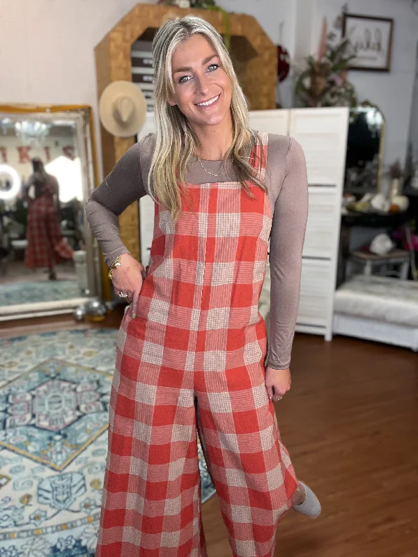 Checkered Wide Leg Jumpsuit Structured jumpsuit, Tailored fit, Professional, Elegant Checkered Wide Leg Jumpsuit Structured jumpsuit, Tailored fit, Professional, Elegant